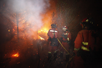 En Carcaixent el fuego se aproximó a zonas habitadas y a la carretera CV-50, en la cual la UME reallizó tareas de contención